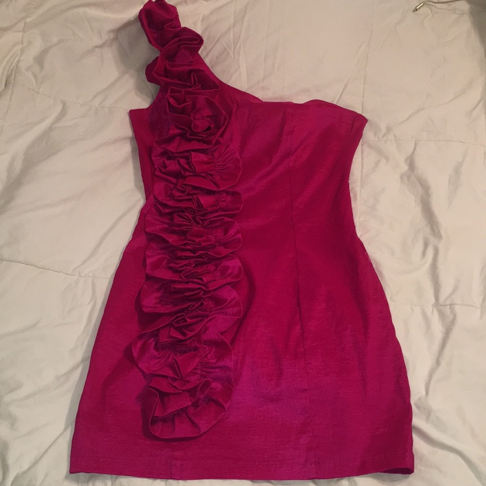 Fuchsia one shoulder mini dress.